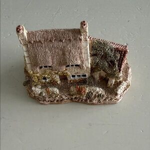 Charming Cottage Sculpture in Natural Tones
